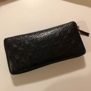 Comme des garçon. Black leather wallet